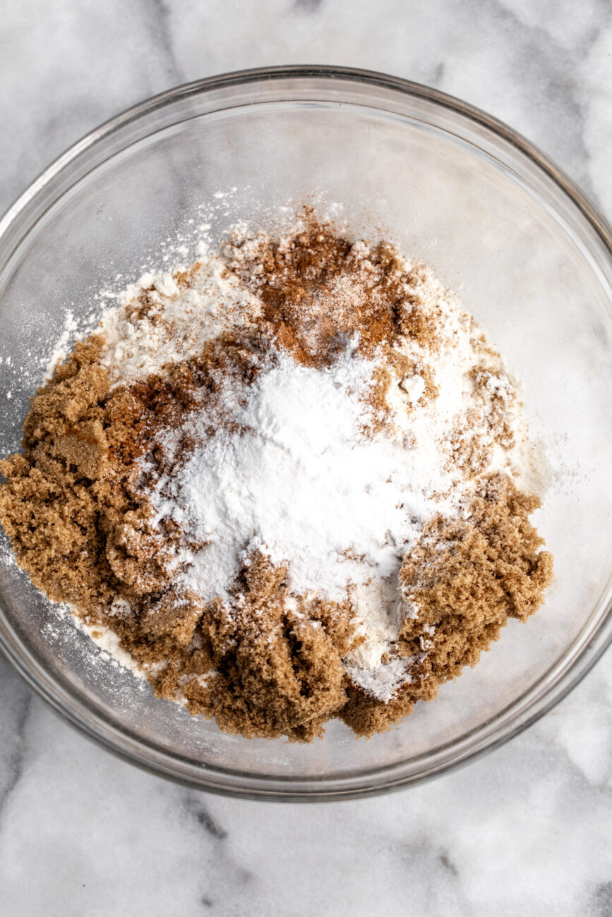 dry ingredients in mixing bowl for baked apple cider donuts.