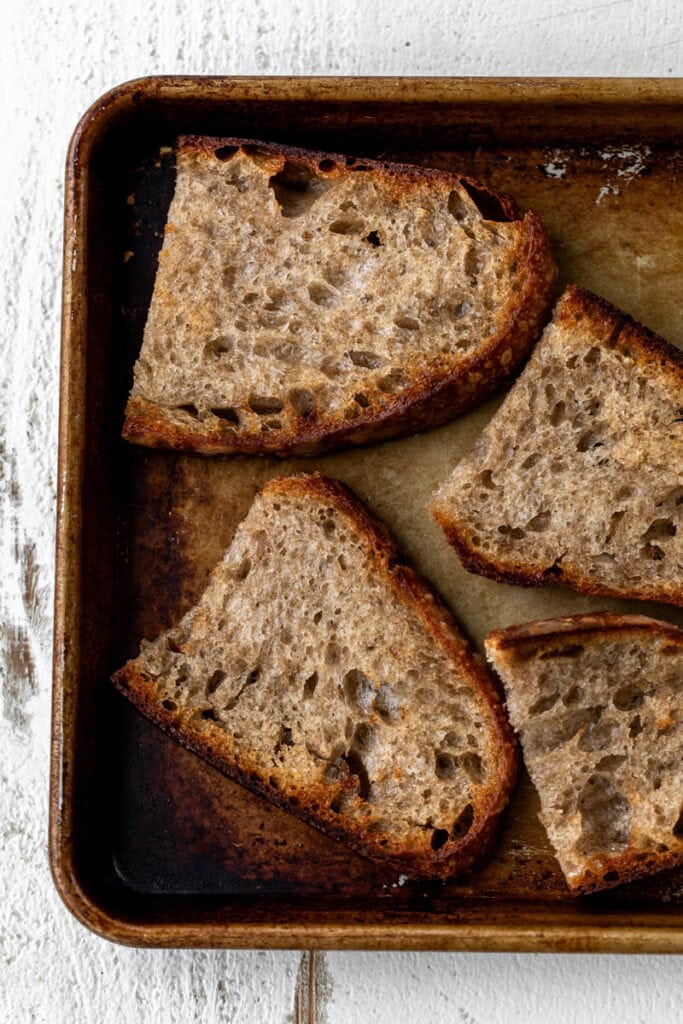 garlic bread toasted on baking sheet.