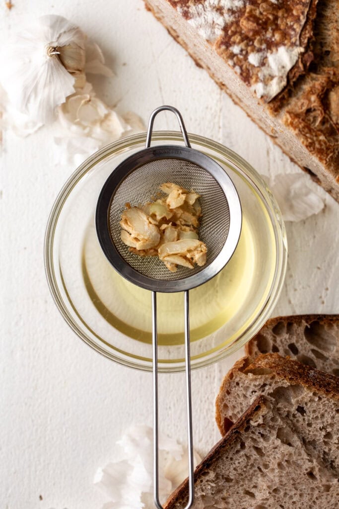 strained garlic cloves from homemade garlic oil.