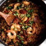 creole jambalaya in large pot with okra, shrimp and andouille sausage.