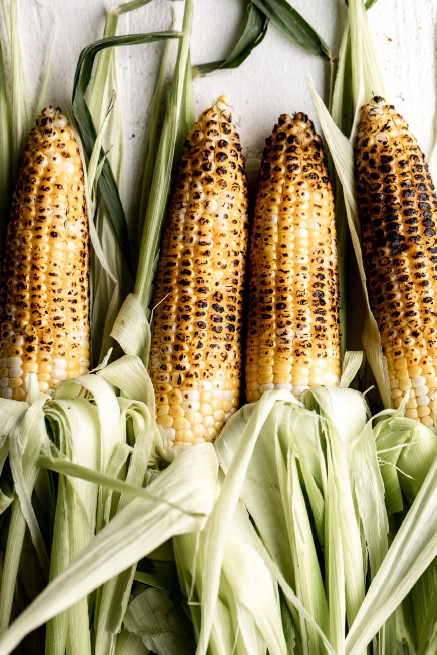 charred ears of corn.