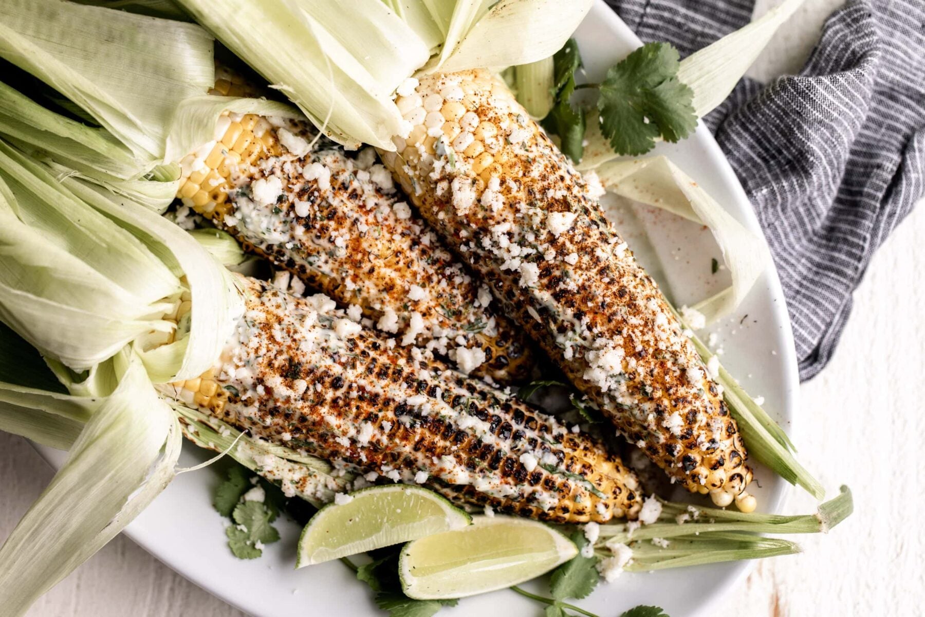 Spicy charred corn with cilantro aioli and cotija.