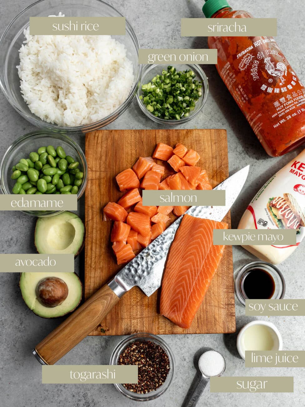 labeled ingredient photo salmon poke with creamy togarashi sauce.