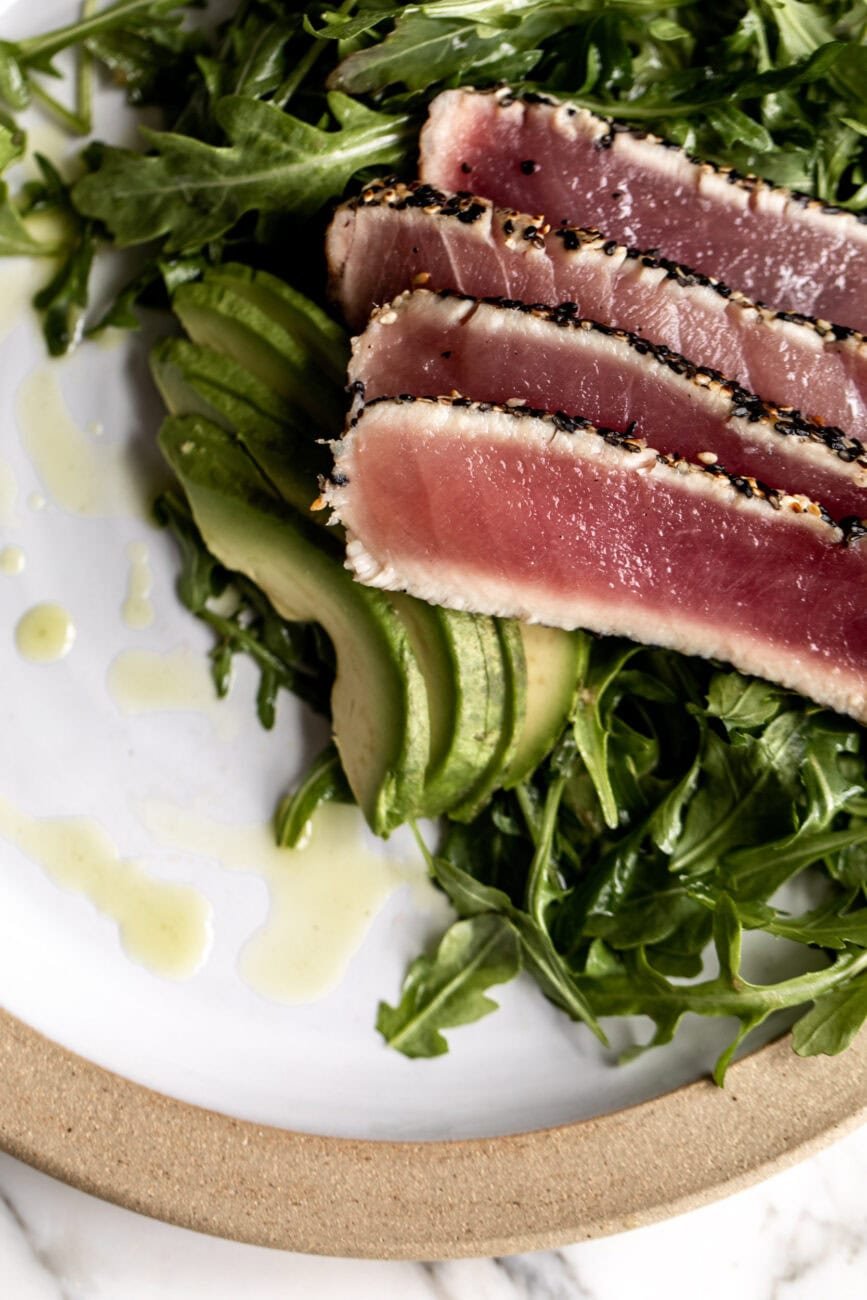 thinly sliced Seared Ahi Tuna recipe with Arugula Salad.