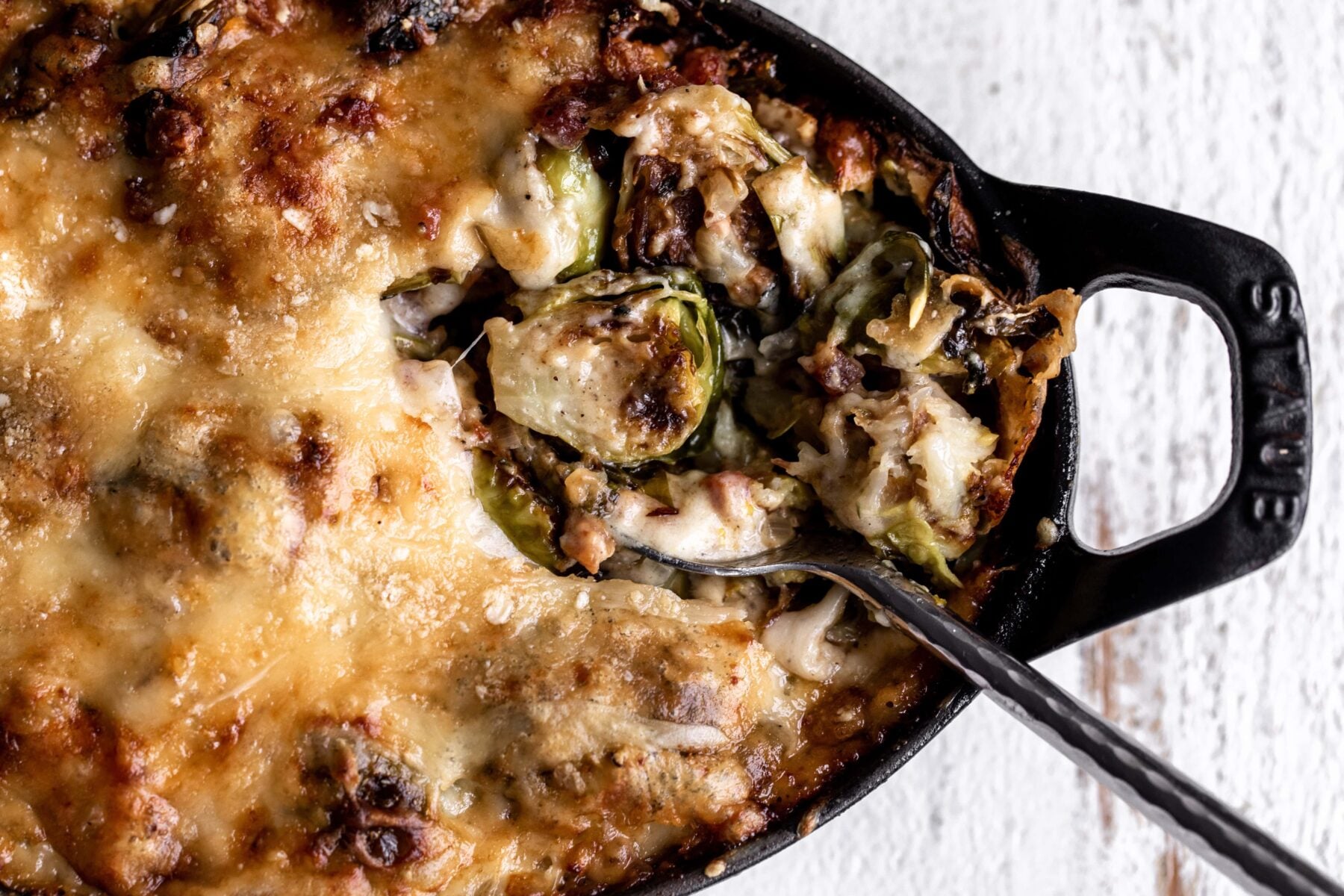 Brussels sprouts gratin with gruyere cheese topping.