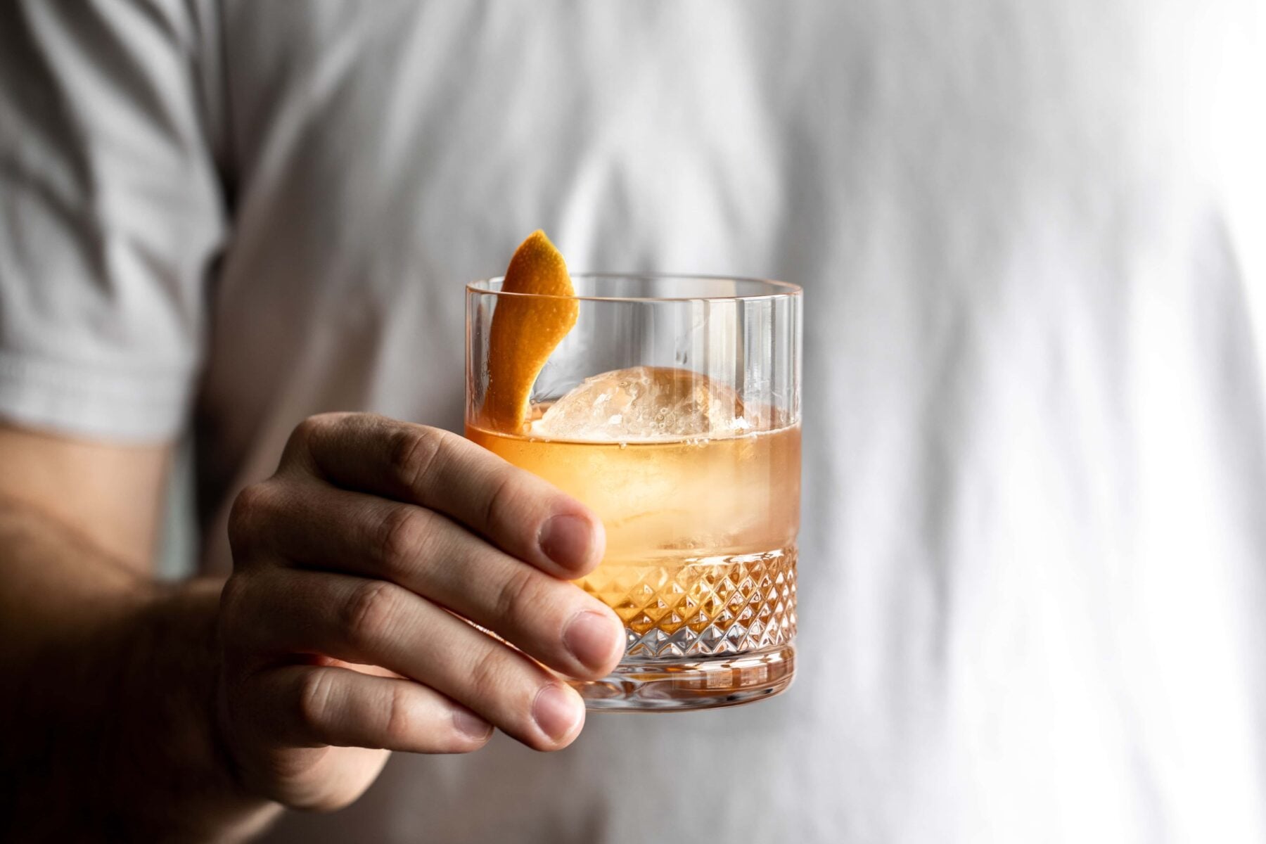 Old fashioned being held.