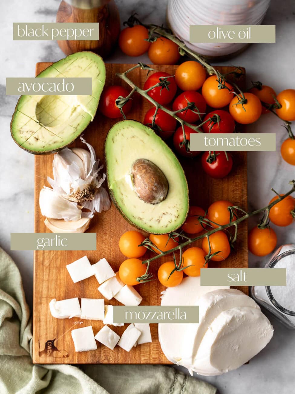 labeled ingredient photo for tomato mozzarella and avocado salad.