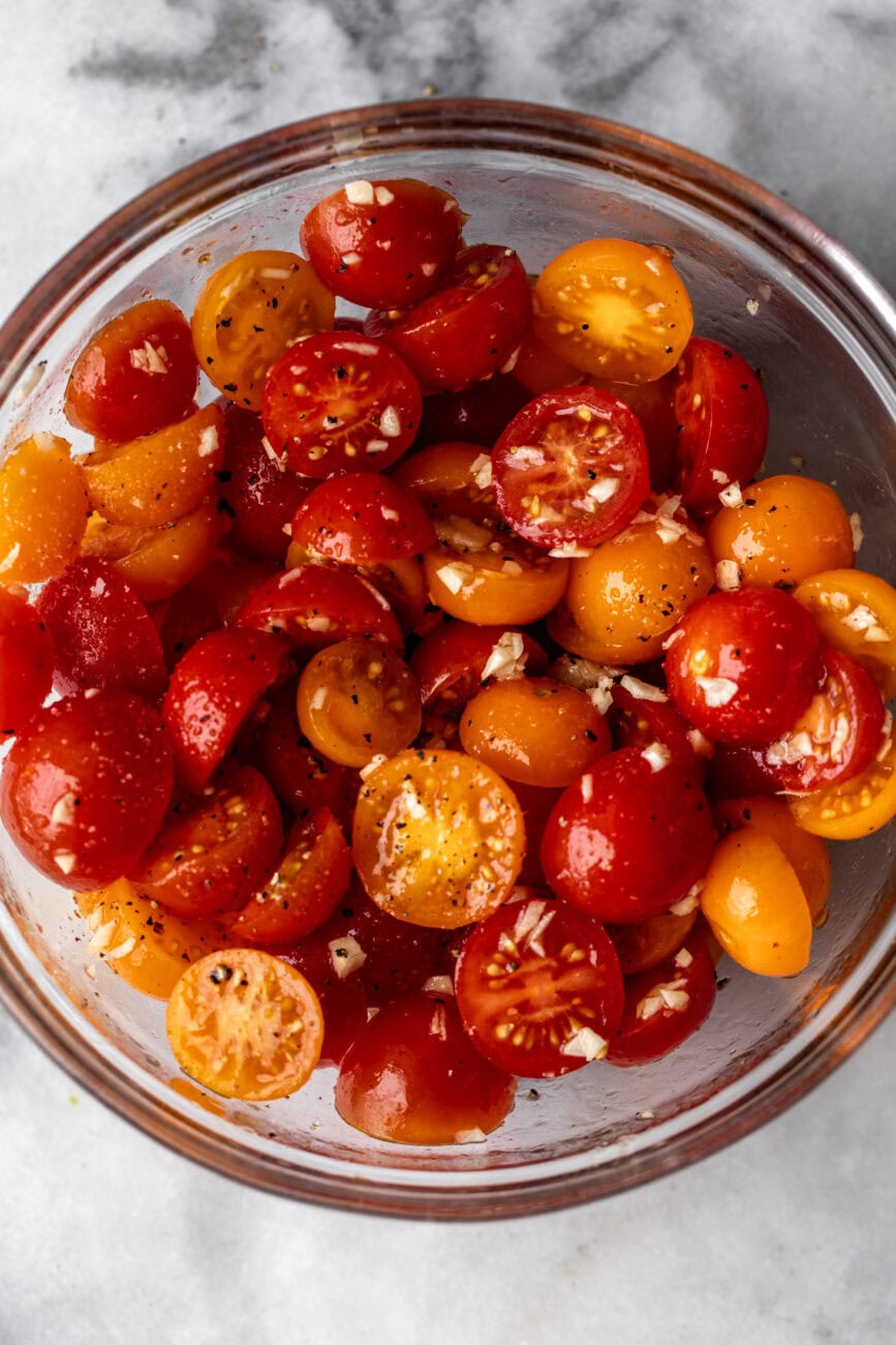 marinated cherry tomatoes with basil and olive oil.
