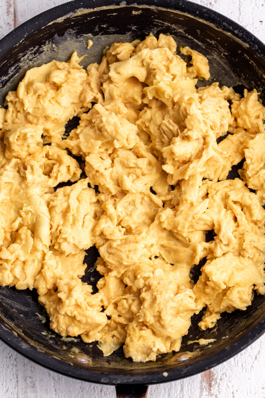 scrambled eggs in pan.