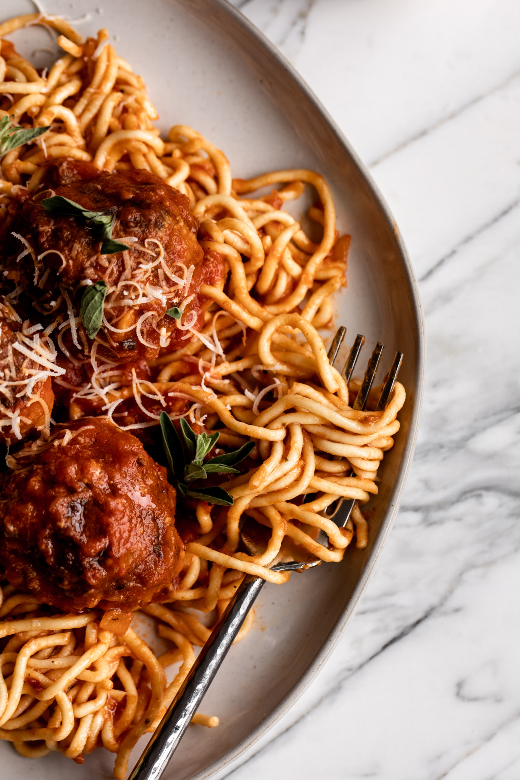 homemade spaghetti wrapped around fork