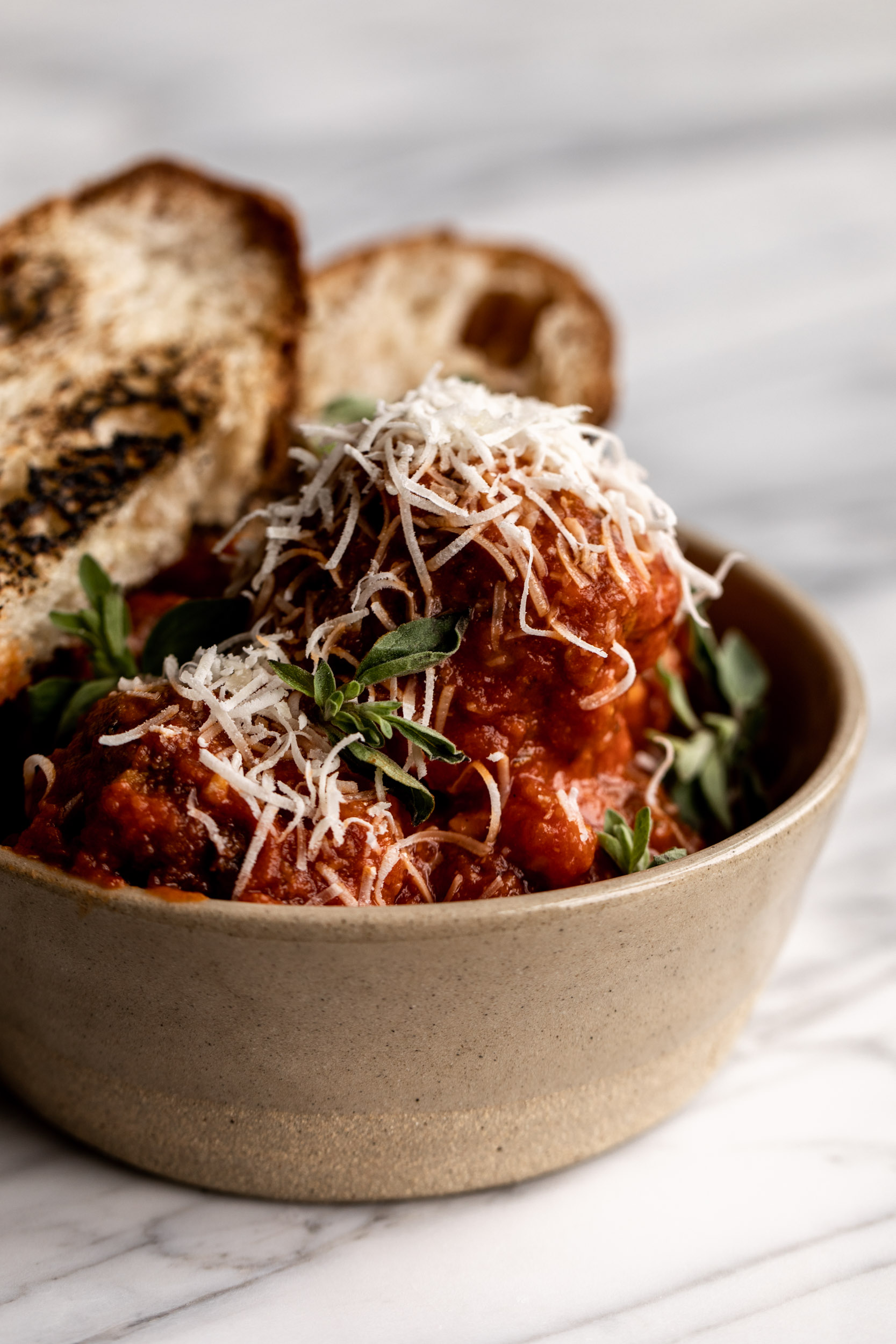 This Italian meatball recipe is made with a combination of 3 types of meat: beef, pork & prosciutto which adds flavor and keeps them moist