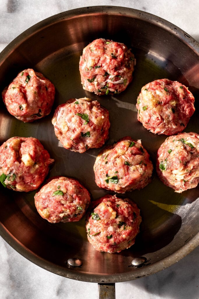 pan fried pork and beef meatballs in olive oil