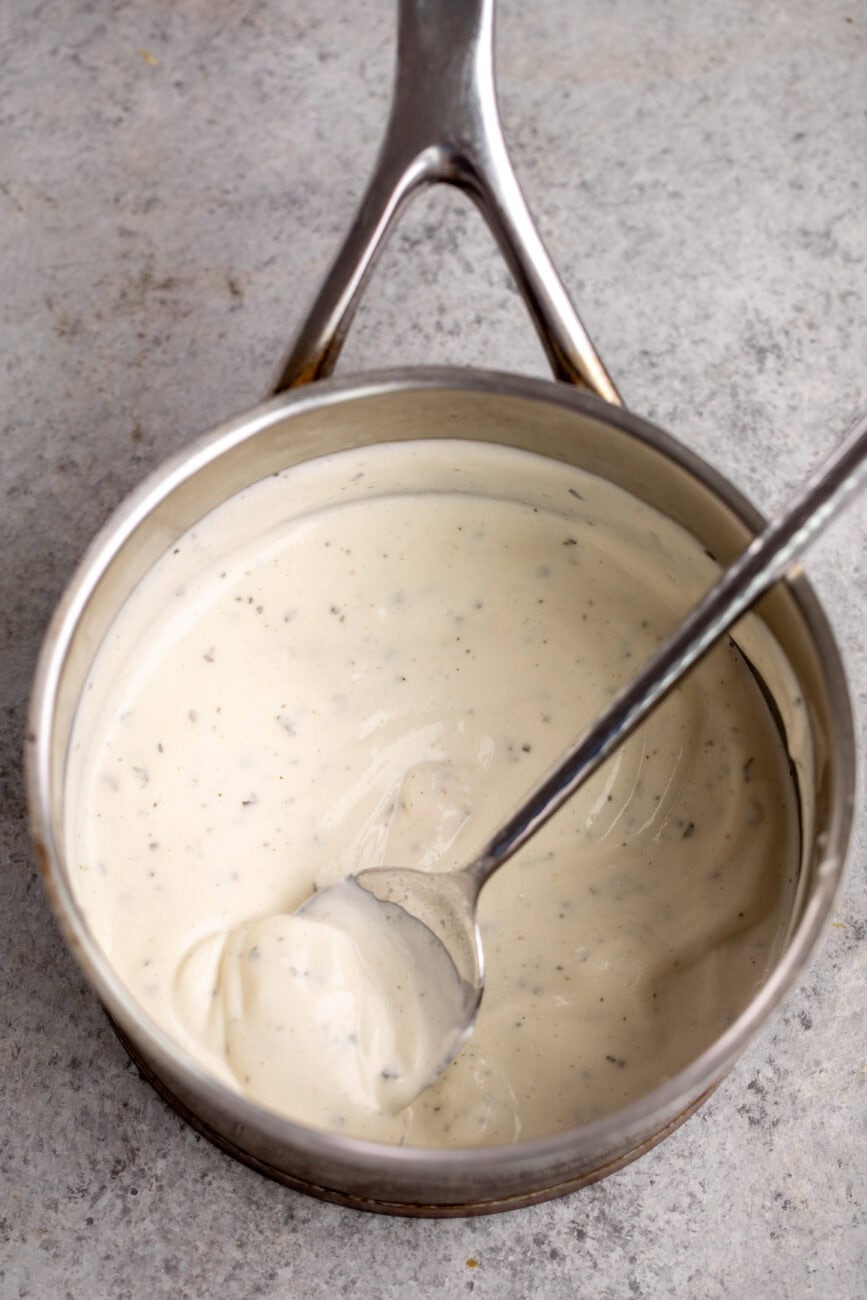 melted boursin cheese in pot.