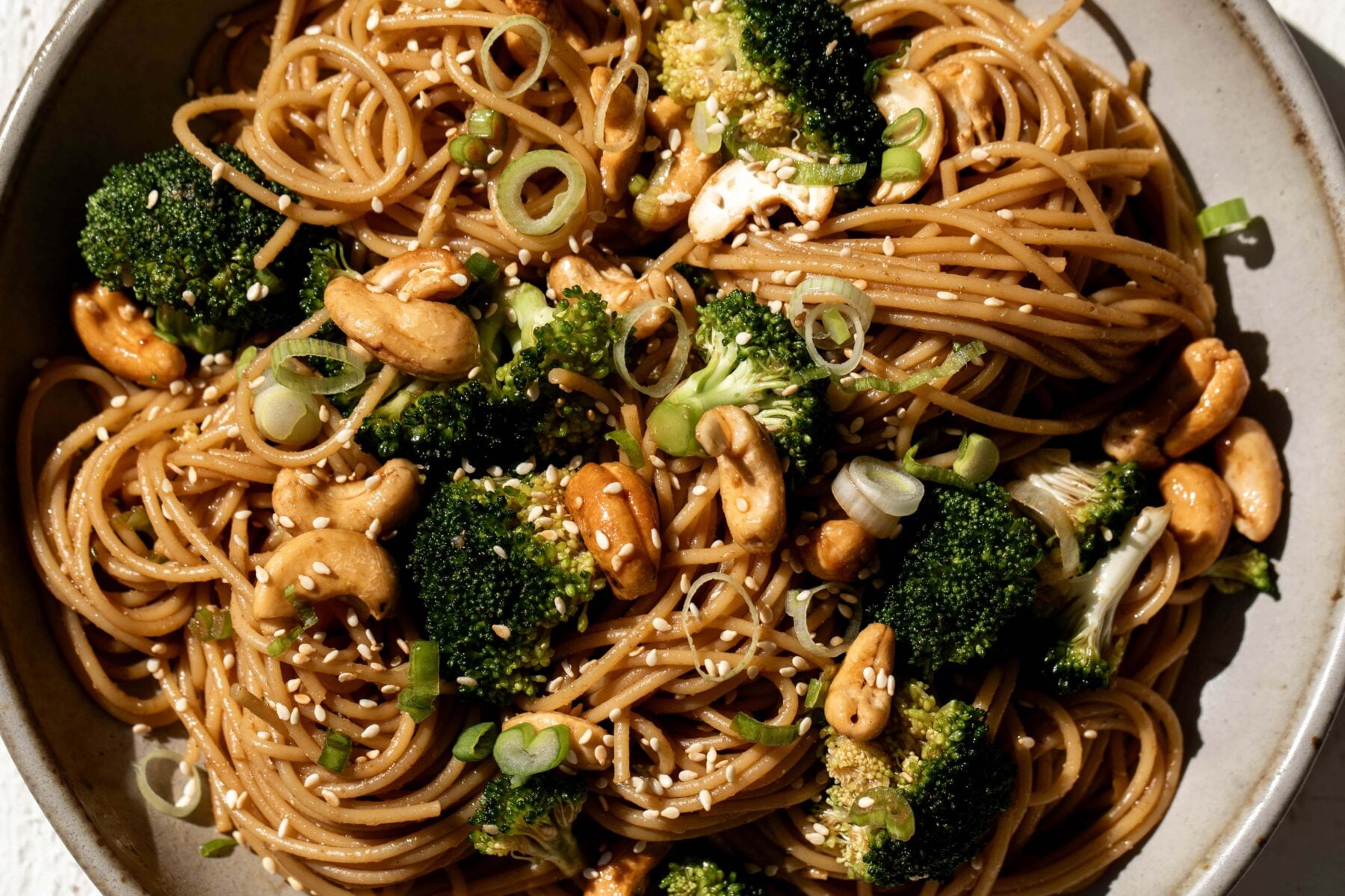cold chinese-inspired noodles with cashews and coriander.