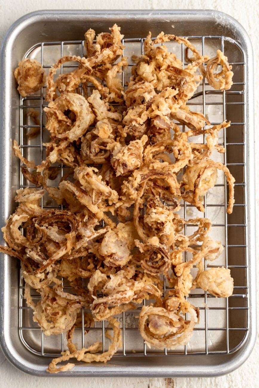 fried crispy battered golden brown shallots.