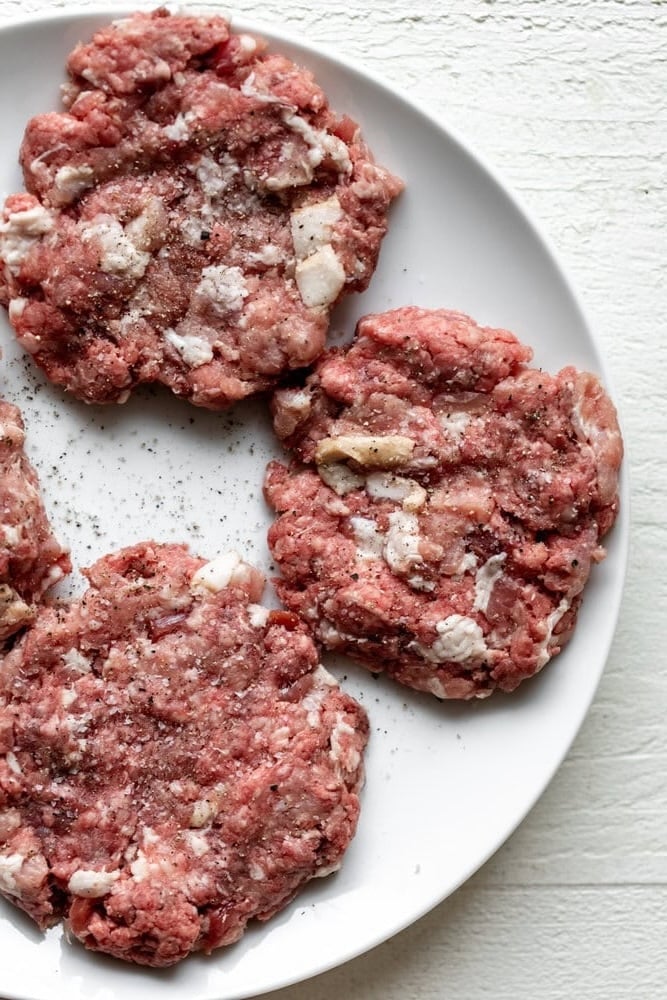 triple play burger pressed out into patties ready for cooking.