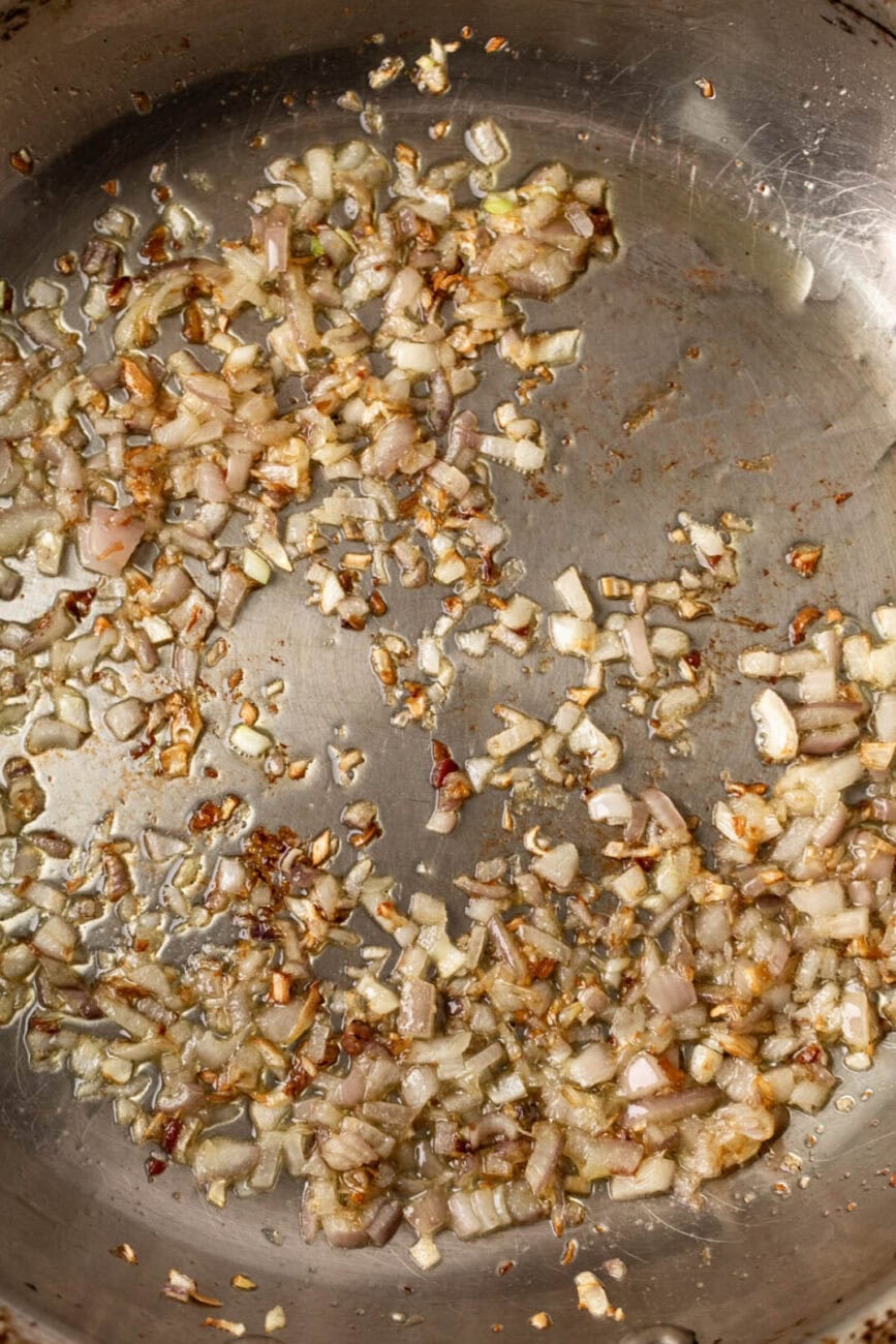 sautéed shallots in pan.