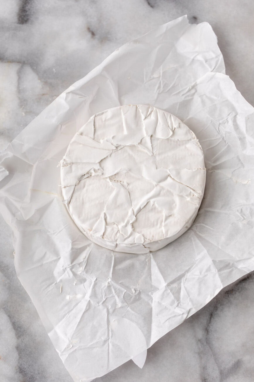 wheel of brie cheese.