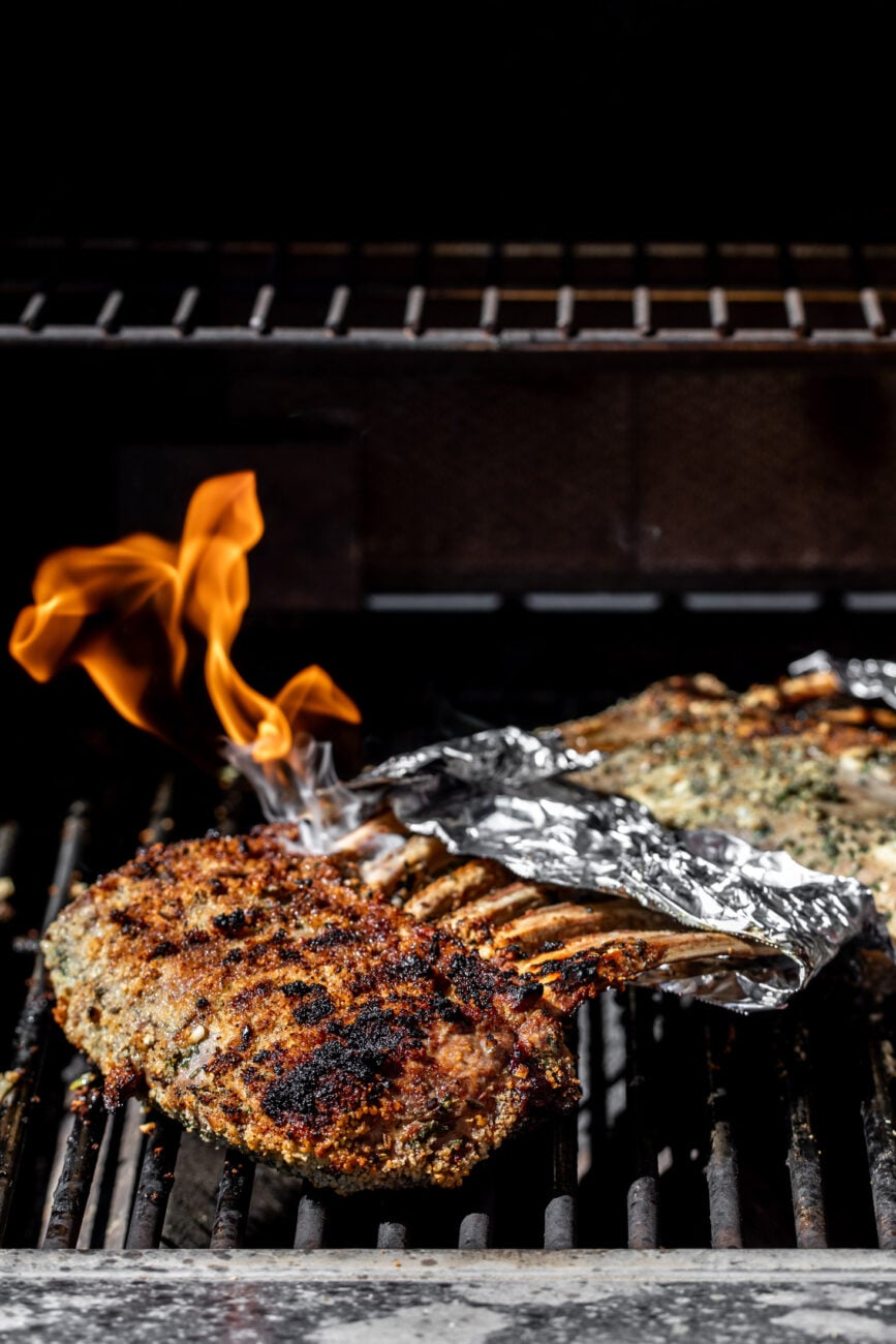 rack of lamb cooking on grill.