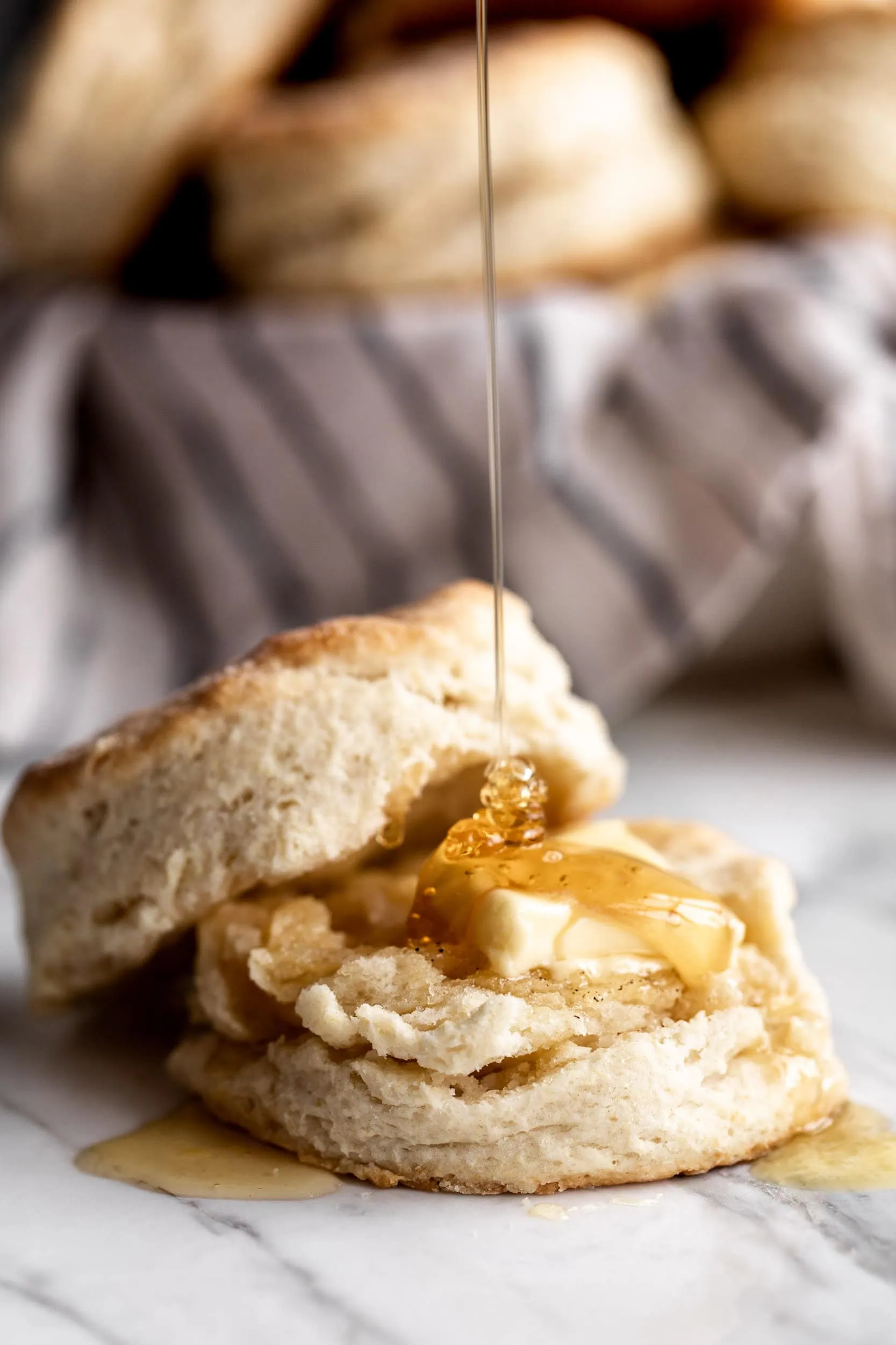 Buttermilk Biscuits with butter and honey drizzle