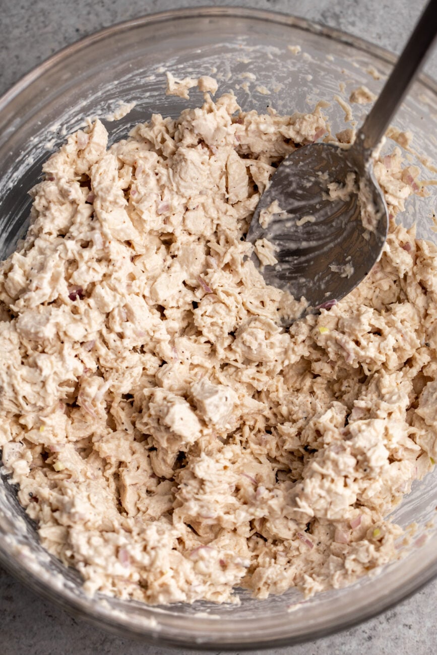 mayo-based chicken salad in mixing bowl.