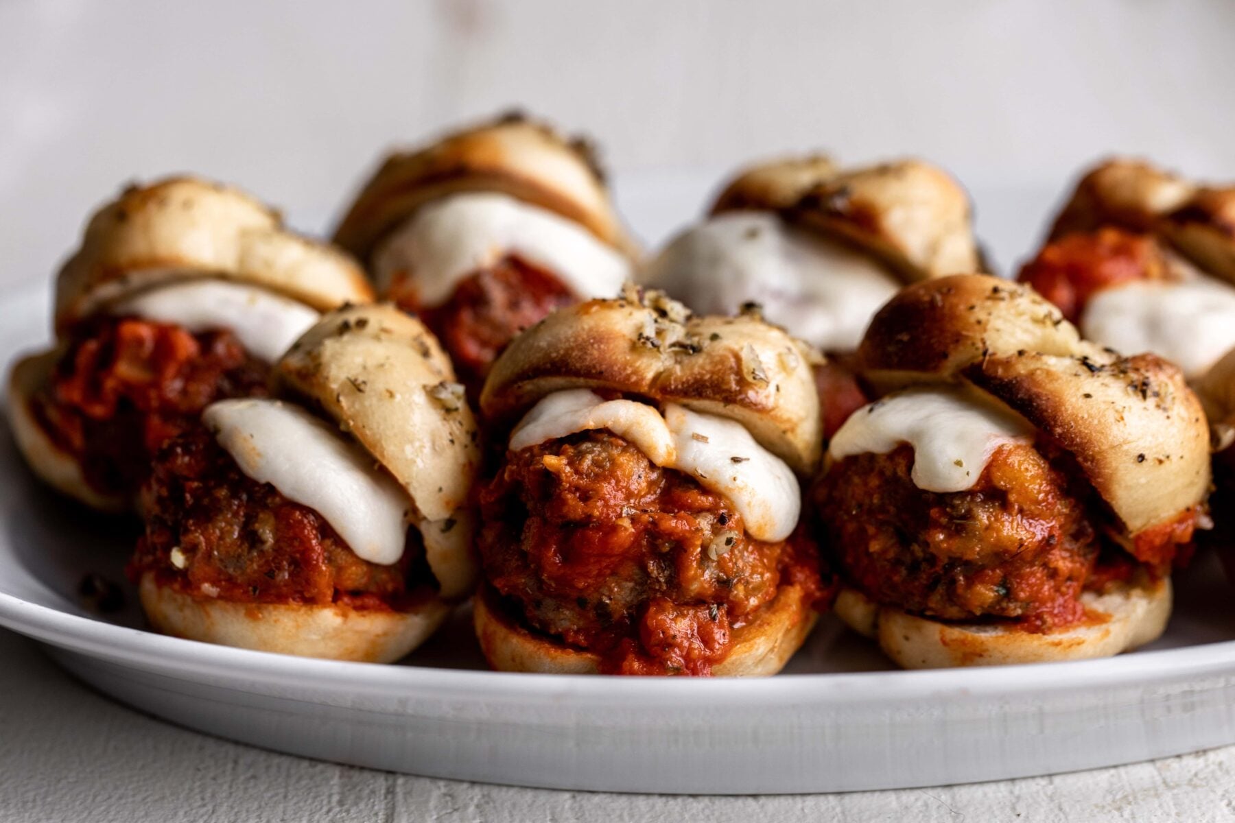 Garlic knot meatball sliders.