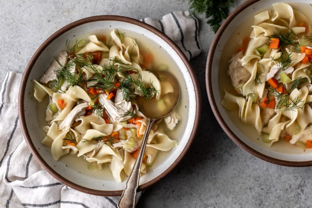 homemade old-school chicken noodle soup bowls.