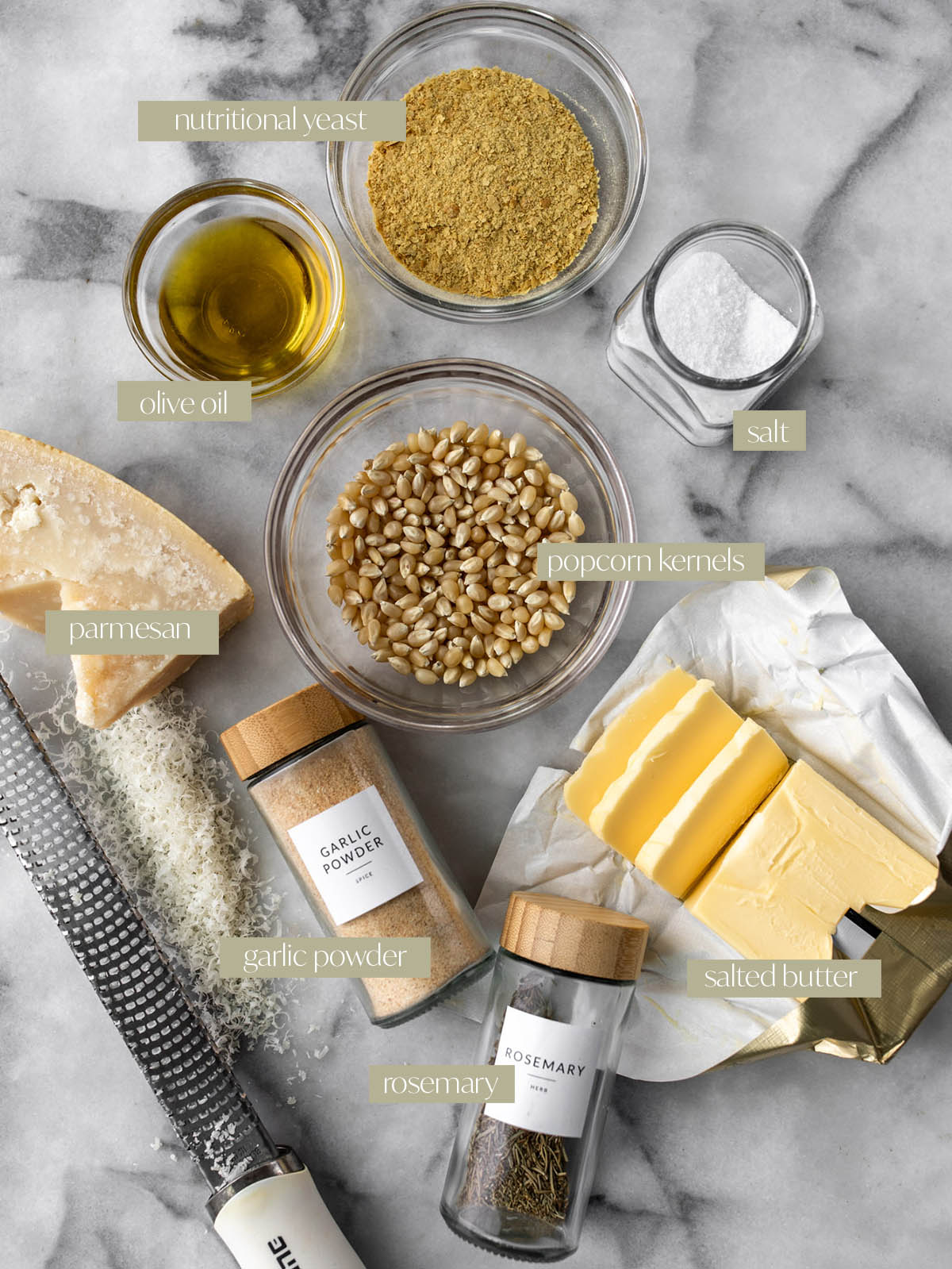 labeled ingredient flatlay stovetop garlic parmesan cheesy popcorn.
