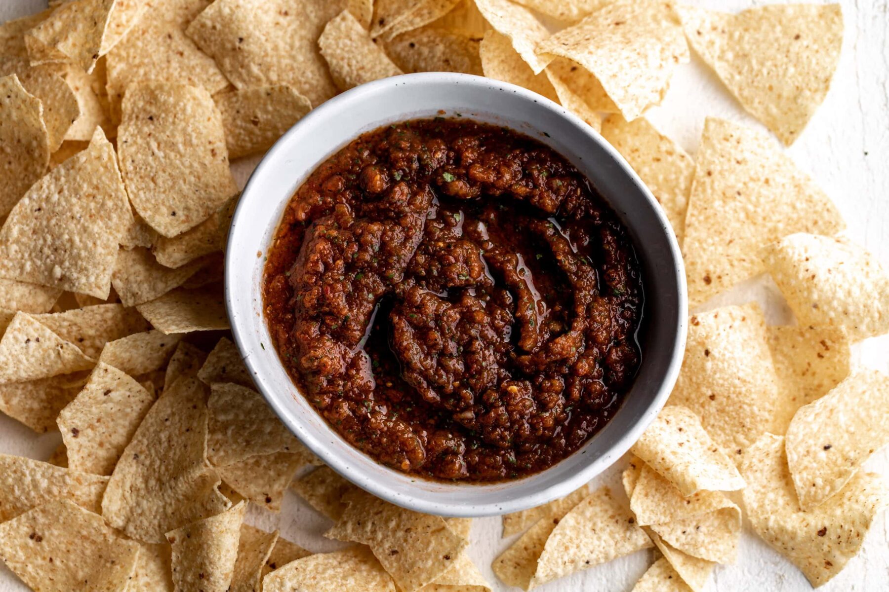 Smokey chipotle salsa with tortilla chips.