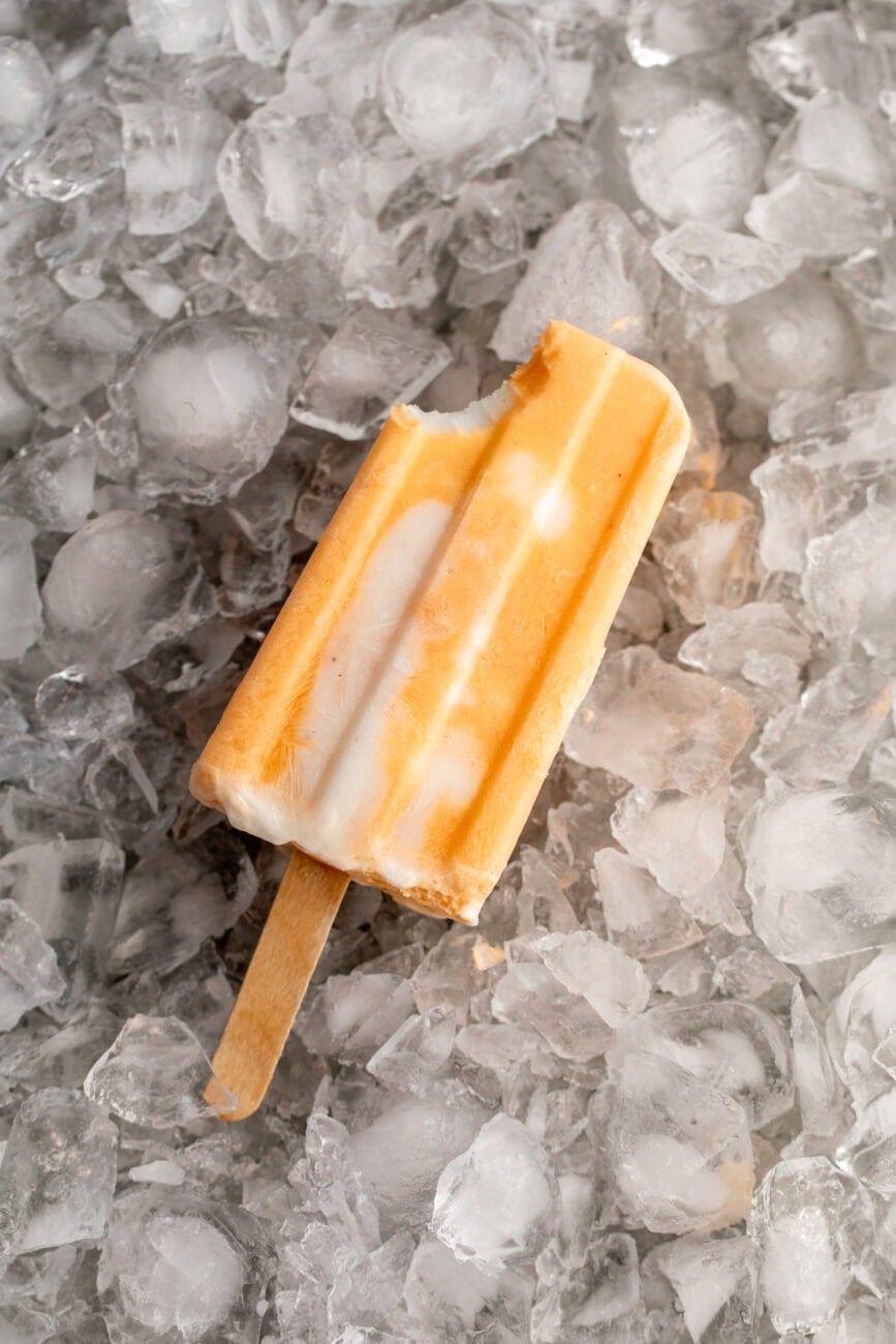 orange julius orange creamsicle popsicles with bite out.