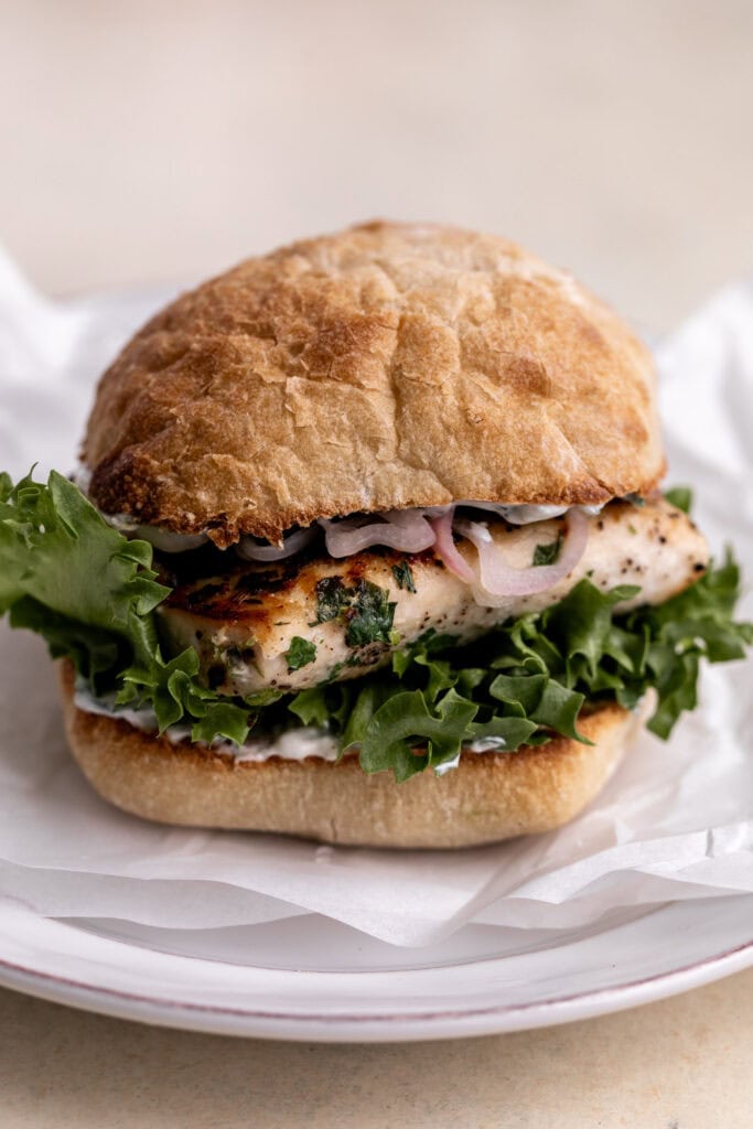 seared mahi mahi fish sandwich on ciabatta roll.