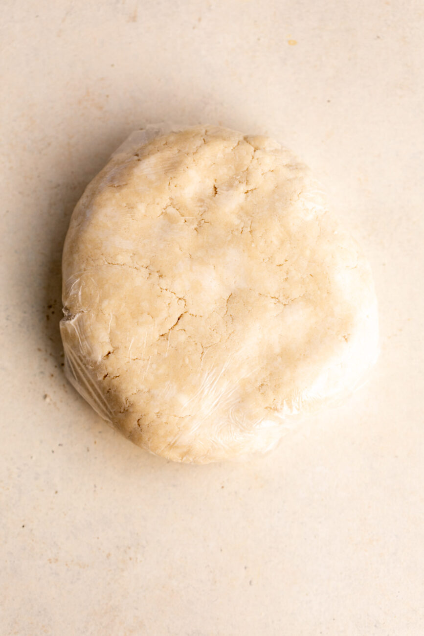 pie dough gathered and wrapped to chill.