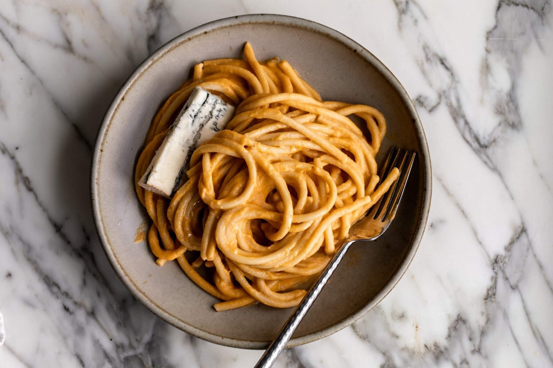 Creamy Pumpkin Pasta with Gorgonzola and fork.