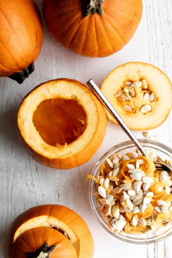 cut open sugar pie pumpkins with seeds scooped out