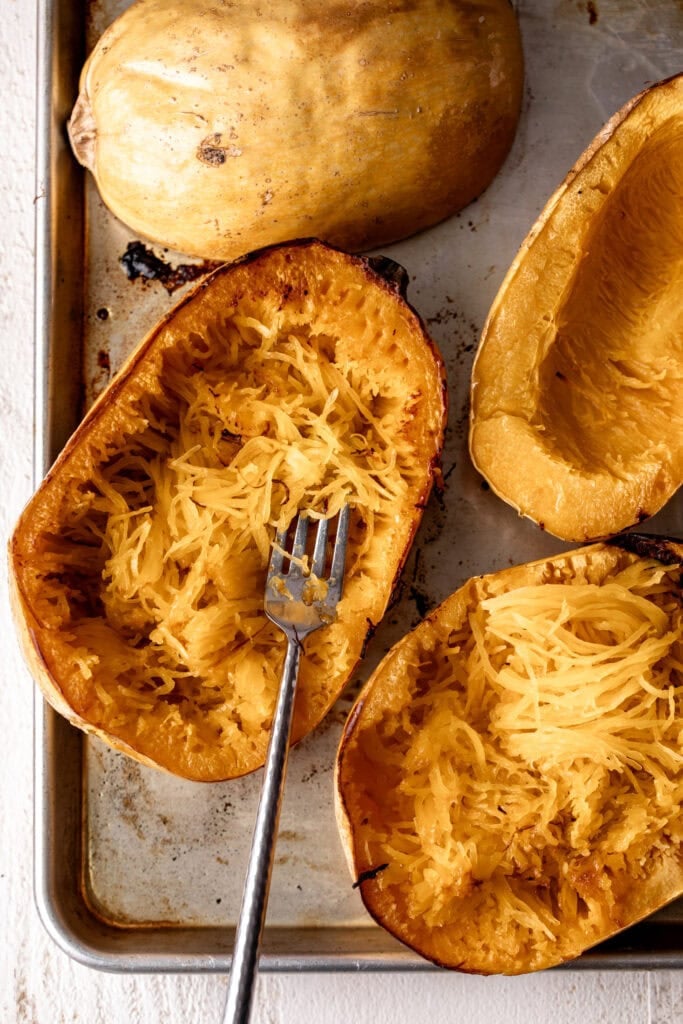 roasted spaghetti squash with fork.