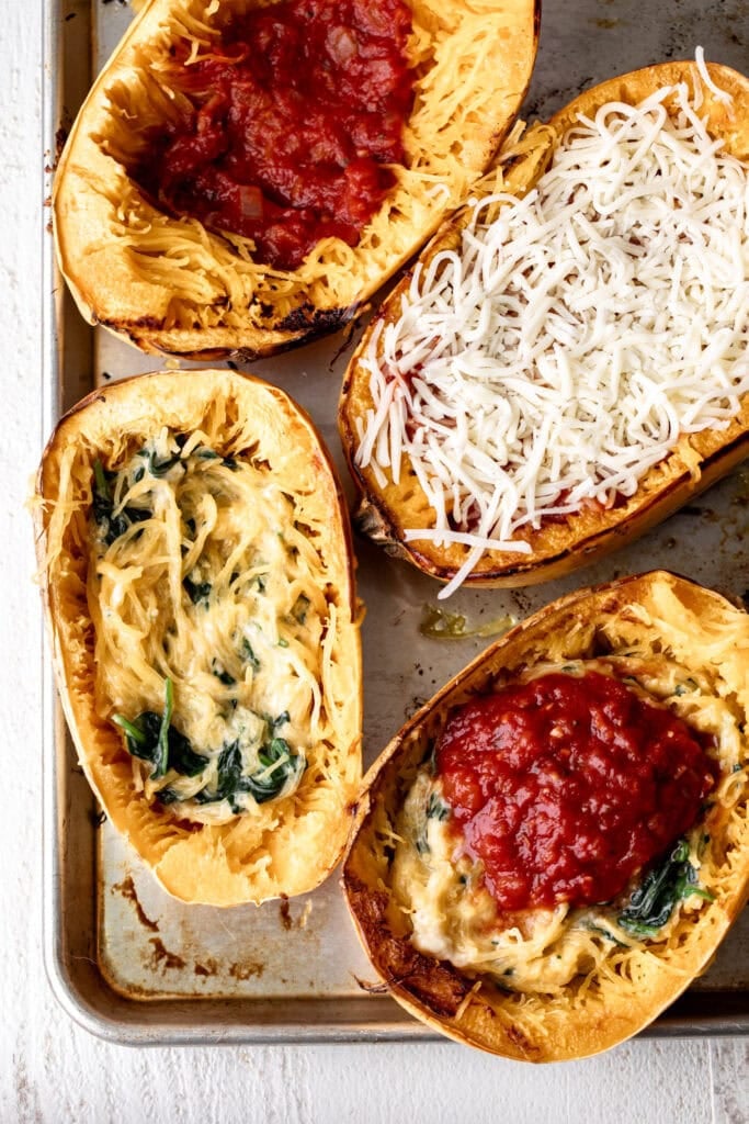 spaghetti squash lasagna boats filled with marinara, spinach and mozzarella.