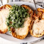 spaghetti squash lasagna boats with mozzarella cheese.