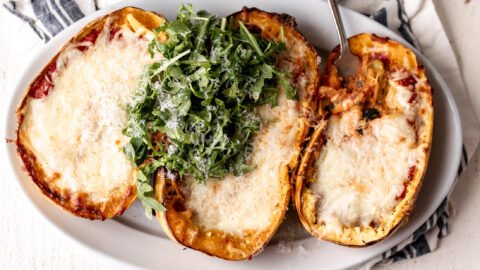spaghetti squash lasagna boats with mozzarella cheese.