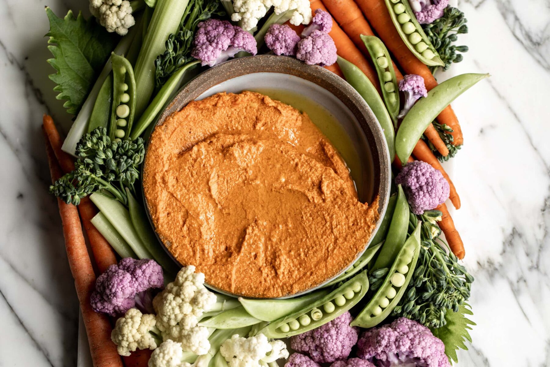 Red pepper and almond creamy romesco spread with crudite.