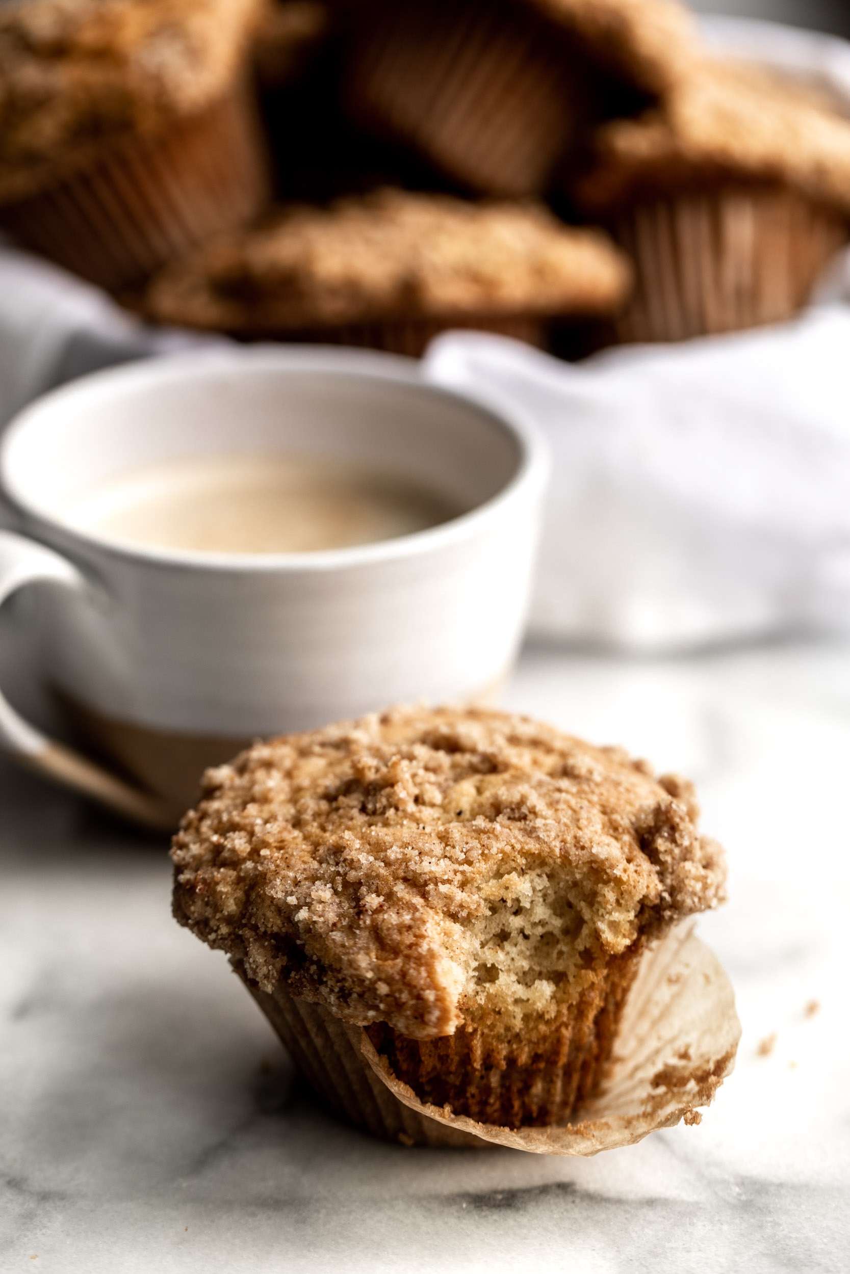 This coffee cake muffin recipe is made with streusel topping with the addition of sour cream bite 