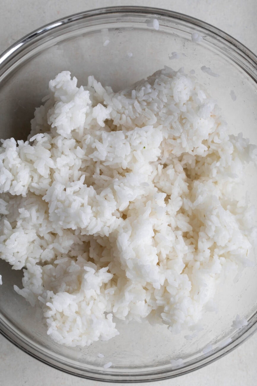 cooked sushi rice seasoned with rice vinegar.