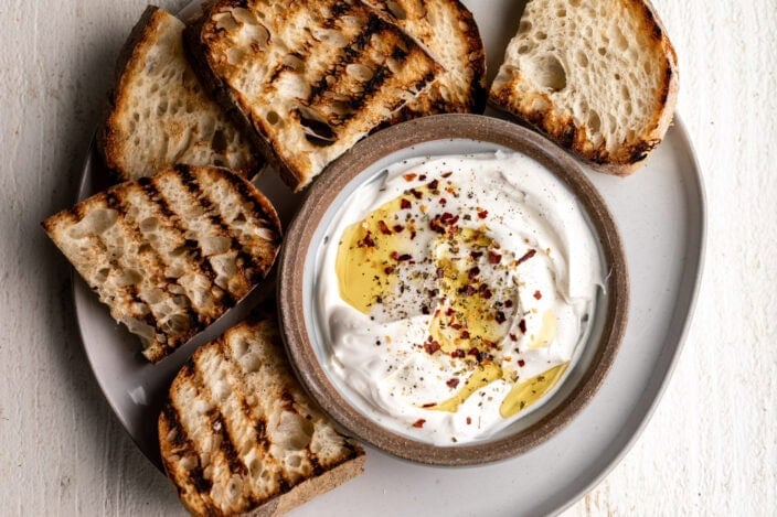 whipped spiced ricotta dip with grilled bread.