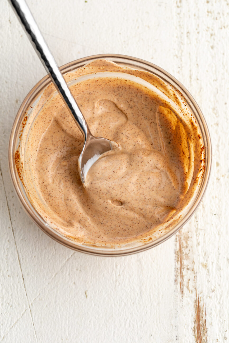 chipotle crema mixture in small glass mixing bowl.