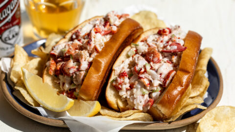 new england style lobster rolls in brioche buns with chips