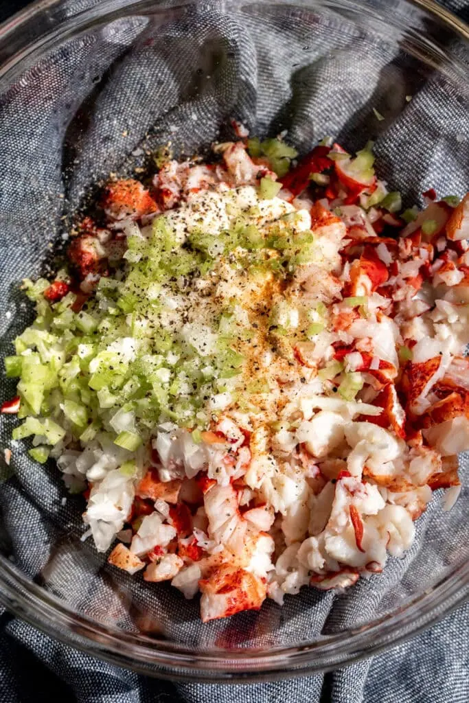 lobster salad ingredients in mixing bowl