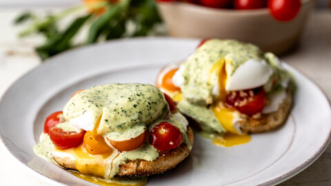 caprese eggs benedict with marinated tomatoes and mozzarella