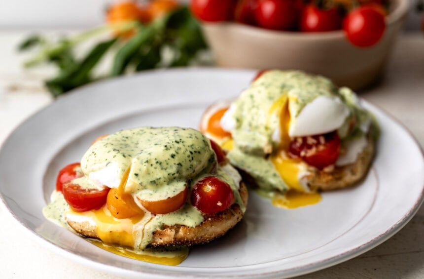 caprese eggs benedict with marinated tomatoes and mozzarella.