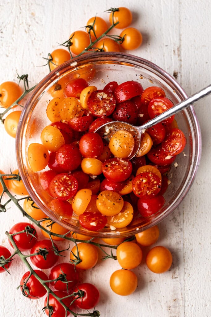 marinated cherry tomatoes on the vine for caprese eggs benedict.