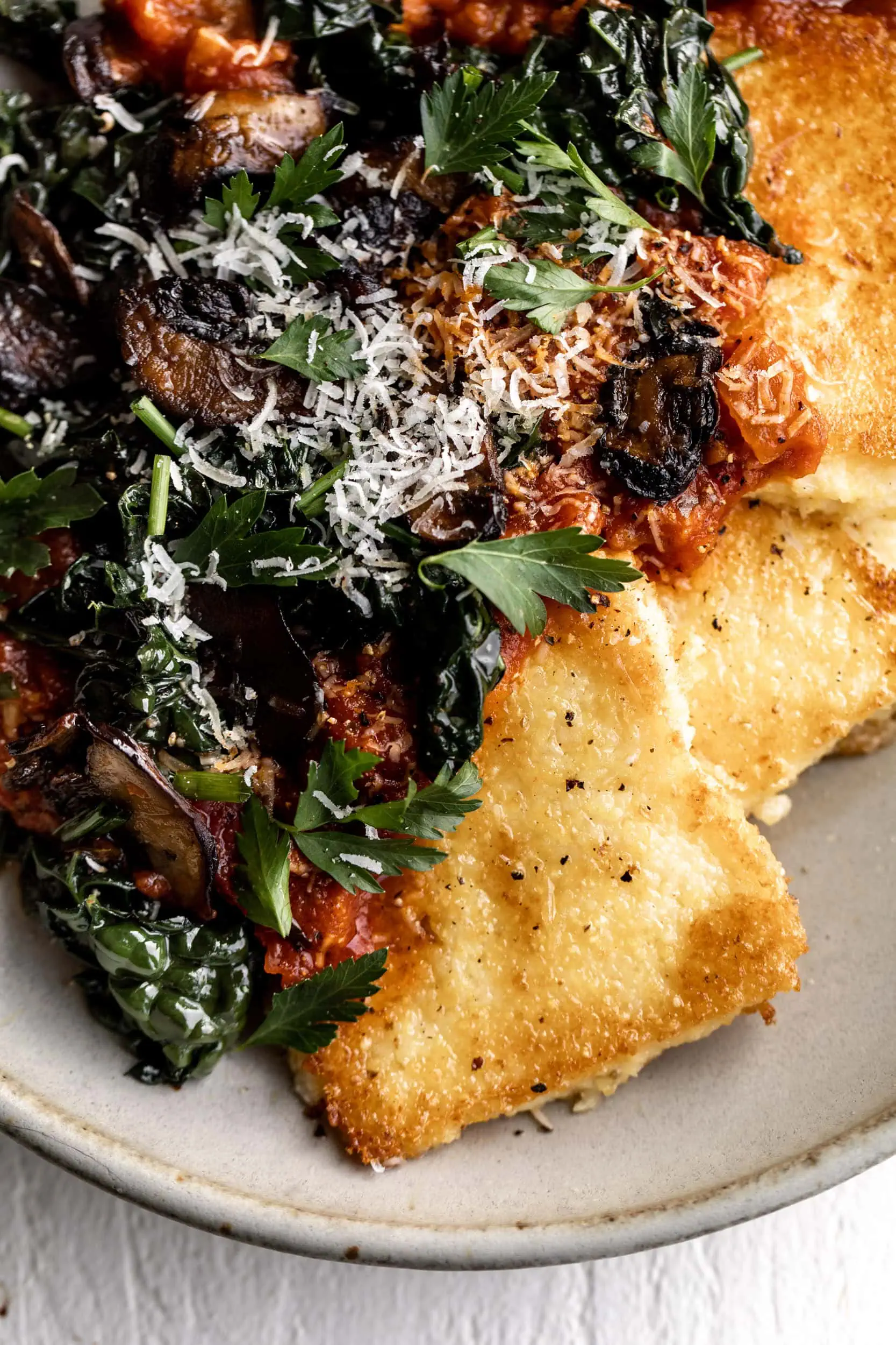 Crispy Polenta with Spicy Tomato Sauce, Sautéed Kale & Mushrooms