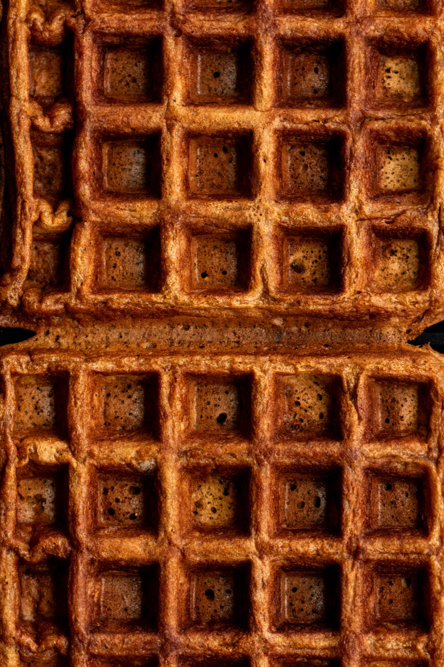 gingerbread waffles in waffle iron.